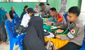 Layanan Kesehatan Gratis Satgas Madago Raya Sasar Warga Desa Kalora